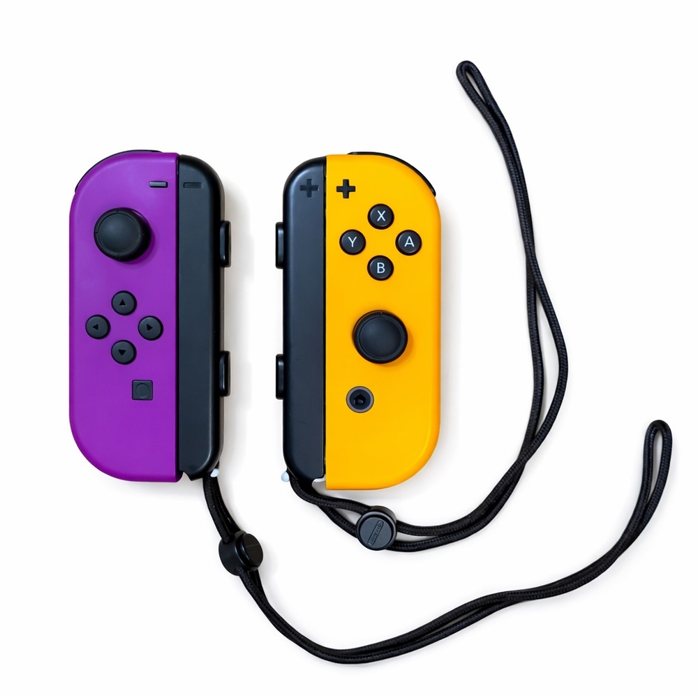 Nintendo Switch Joy-Con Controllers (Purple & Orange) + Straps